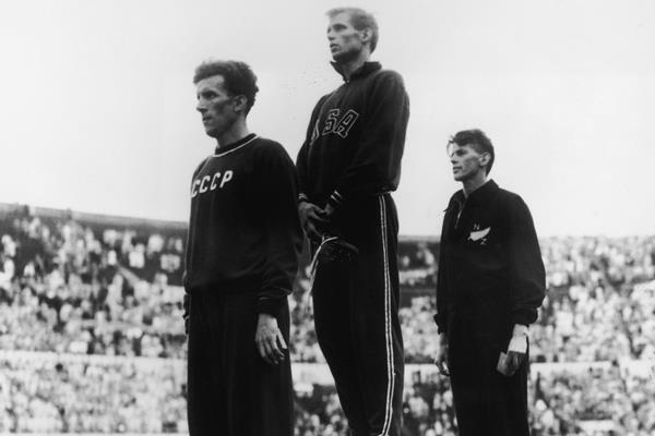 Charles Moore (centre) on the podium at the 1952 Olympics (Getty Images)