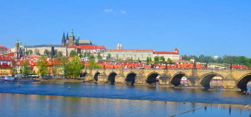 Prague_Charles_Bridge_With_Prague_Castle_In_Background.jpg