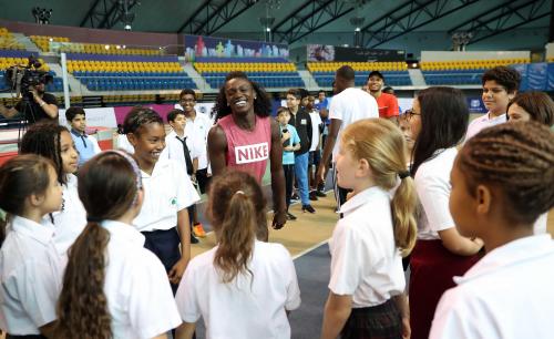 Schoolchildren getting some tips from Gold olympic medallist Dawn Harper-Nelson.jpg