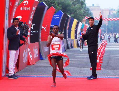 Berhanu Legese winning at the Airtel Delhi Half Marathon 2017.jpg