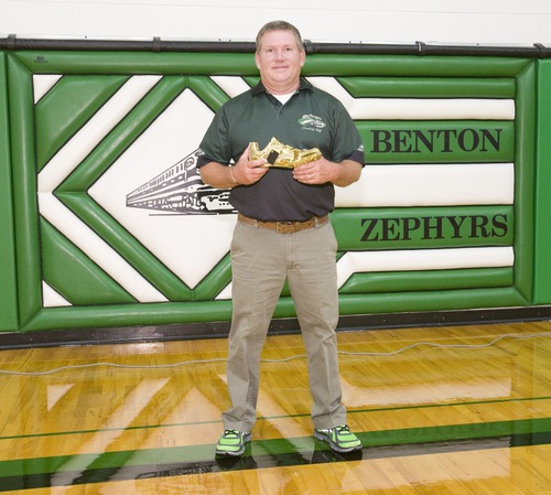 Coach Raley and his golden spike.jpg