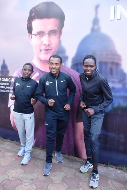 Kenenisa Bekele at the TSK25K press conference with Valentine Kipketer and Helah Kiprop .JPG